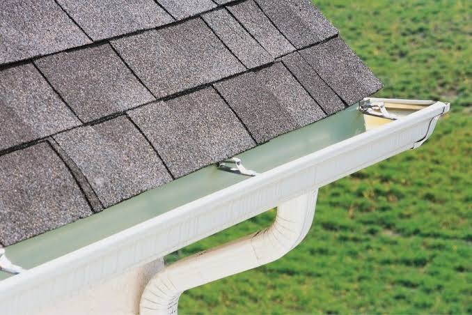 Seamless aluminium gutters fitted along a new roofline